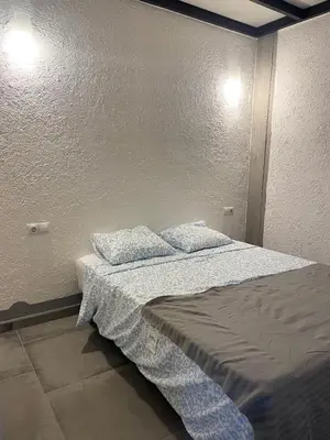 Cama o camas de una habitación en Cartagena Bajo 01