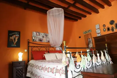 Cama o camas de una habitación en Histórica Casa con vistas al Jardín de Cactus y montañas