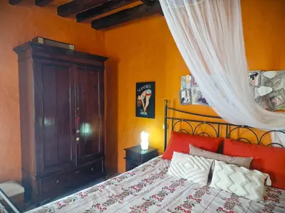 Cama o camas de una habitación en Histórica Casa con vistas al Jardín de Cactus y montañas