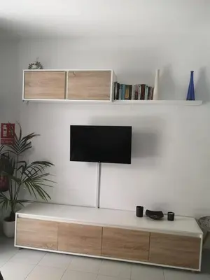 Una televisión o centro de entretenimiento en Casa Soleada Mañana