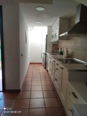 Una cocina o zona de cocina en Bungalow Sonemar - Summer Mary GC