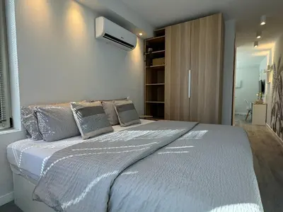 Cama o camas de una habitación en Danubio Estudios 107