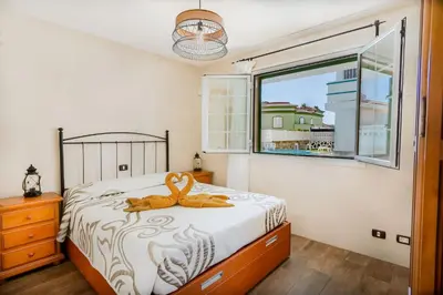Cama o camas de una habitación en El Refugio de Aitana by Homestaygranacanaria