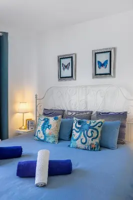Cama o camas de una habitación en Ocean Breeze 50 meters to the beach