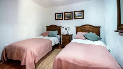 Cama o camas de una habitación en Casas rurales de Guayadeque