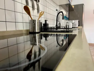 Una cocina o zona de cocina en FlatsBahiaArinaga En Playa de Arinaga con garaje