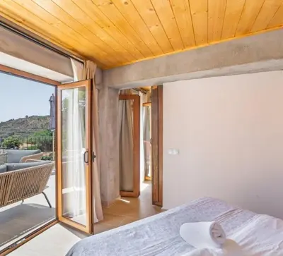 Cama o camas de una habitación en LA MADRIGUERA De FUENTE HERVERA
