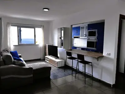 Una televisión o centro de entretenimiento en Vivelorural comfy apartment wifi & beach -Gáldar