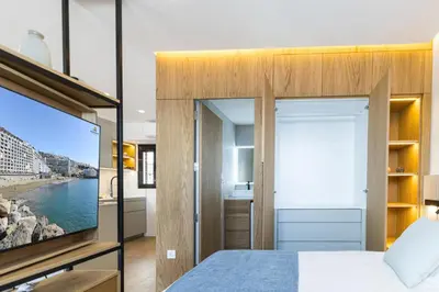 Cama o camas de una habitación en Los Canarios 527 by VillaGranCanaria