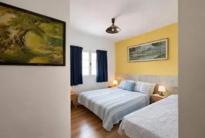 Cama o camas de una habitación en Arguineguin apartment terrace swimming pool