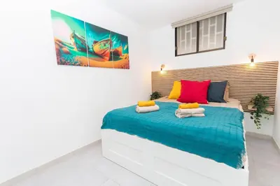 Cama o camas de una habitación en Almodo Suite Puerto Rico