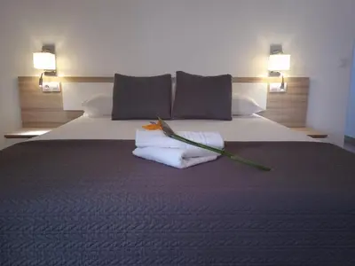 Cama o camas de una habitación en Casas Rurales Don Emilio