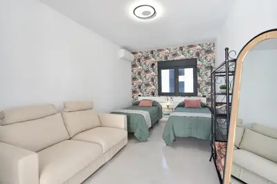 Cama o camas de una habitación en Armonia Oasis DeLuxe by VillaGranCanaria