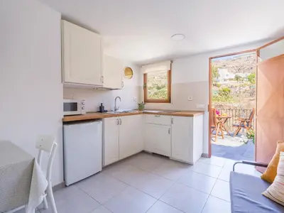 Una cocina o zona de cocina en Casita Flor y Lluvia