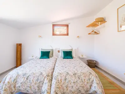 Cama o camas de una habitación en Casita Flor y Lluvia