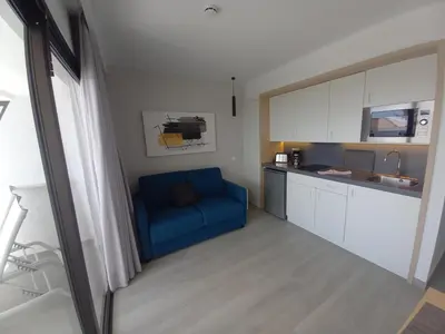 Una cocina o zona de cocina en Apartamentos Marivista