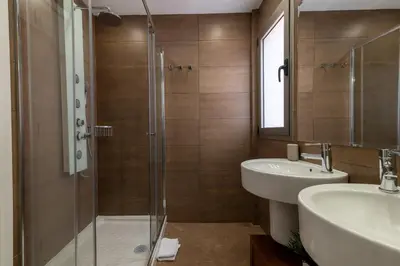 Un baño de Serenity Villa Tauro