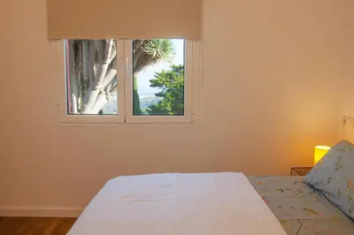 Cama o camas de una habitación en Casa Drago - Stylish 1BR apartment with Panoramic Views