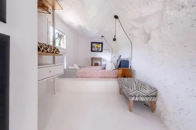 Cama o camas de una habitación en Las Cuevas de Sacromonte