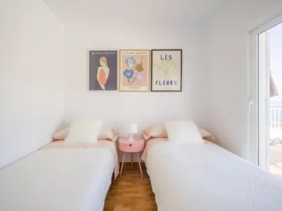 Cama o camas de una habitación en Sunset House los Caideros