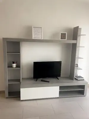Una televisión o centro de entretenimiento en Apartamento Los Molinos