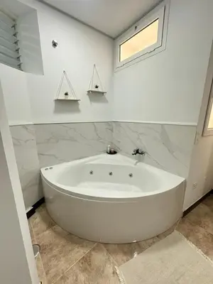 Un baño de Flat with jacuzzi in suite