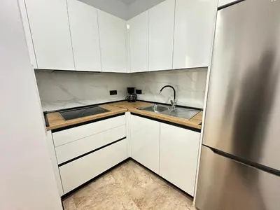 Una cocina o zona de cocina en Flat with jacuzzi in suite