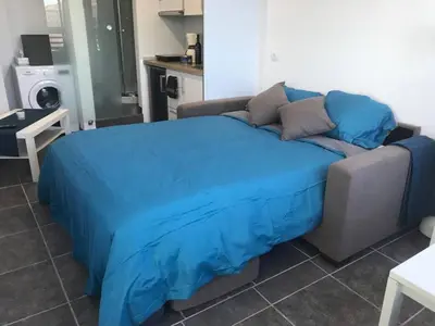 Cama o camas de una habitación en Mini estudio cerca de la playa