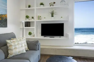 Una televisión o centro de entretenimiento en Villa Quintanilla by Villas Rivero