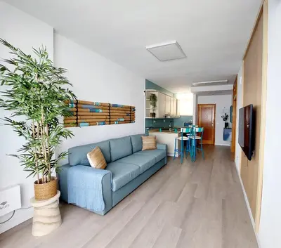 Zona de estar de Apartamento céntrico con playa y piscina