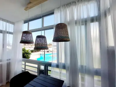 Piscina en o cerca de Apartamento céntrico con playa y piscina
