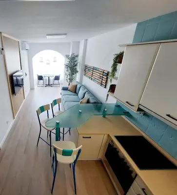Una cocina o zona de cocina en Apartamento céntrico con playa y piscina