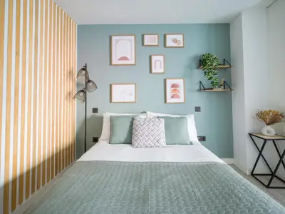Cama o camas de una habitación en Moderno estudio & zona gourmet & shopping GB2B