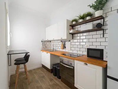 Una cocina o zona de cocina en Cerca de la playa con azotea