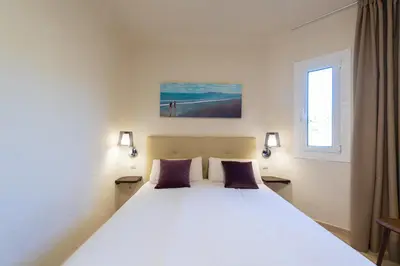 Cama o camas de una habitación en Altamar, 2 Bedroom - by Gestión Vacacional Canarias