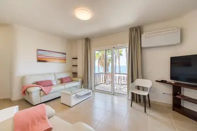 Una televisión o centro de entretenimiento en Altamar, 2 Bedroom - by Gestión Vacacional Canarias