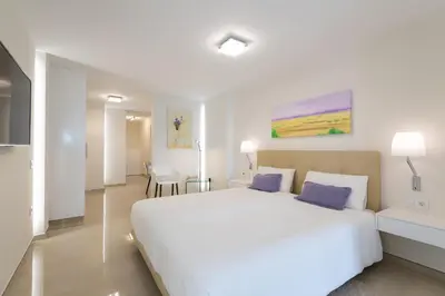Cama o camas de una habitación en Suite Altamar - by Gestión Vacacional Canarias