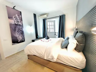 Cama o camas de una habitación en PAMRO moderner Bungalow - 4 Schlafzimmer - 2 Bäder - Whirpool - Ferienanlage mit Pool - Familienfreundlich