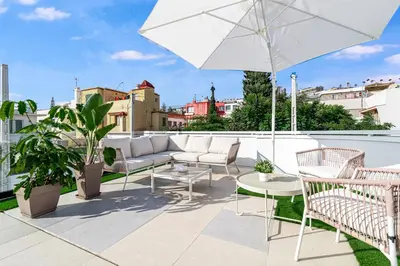 Un balcón o terraza de La Vega de Ciudad Jardín Suites