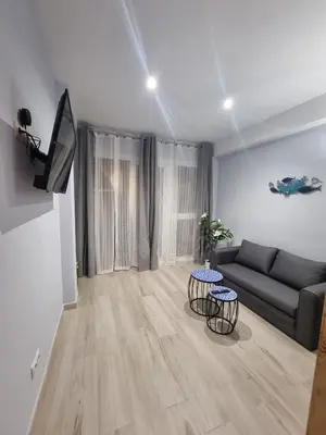 Una televisión o centro de entretenimiento en casa CARIN