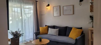 Zona de estar de Capri Casa Infinita