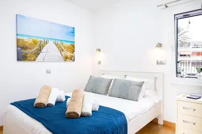 Cama o camas de una habitación en Aquarius 18 by VillaGranCanaria