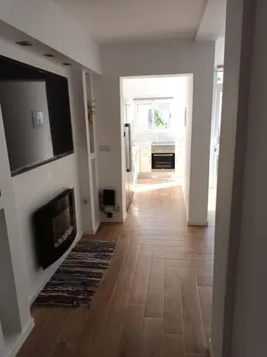 Una televisión o centro de entretenimiento en La casa de massia