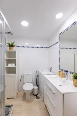 Un baño de Estudio frente a la playa de Las Canteras S63