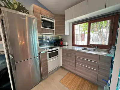 Una cocina o zona de cocina en Parrot Cage - the Gay Villa