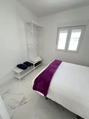 Cama o camas de una habitación en Perla del sur