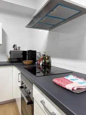 Una cocina o zona de cocina en La Perla de Las Canteras