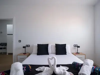 Cama o camas de una habitación en Suans House