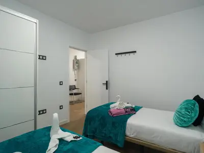 Cama o camas de una habitación en Suans House