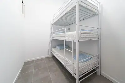 Cama o camas de una habitación en Hostel Las Palmas by Youroom